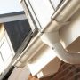 Lindab Steel Downpipe Bend with Socket 70 - 100mm Antique White