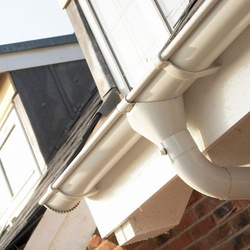 Lindab Steel Downpipe Bend with Socket 70 - 87mm Antique White
